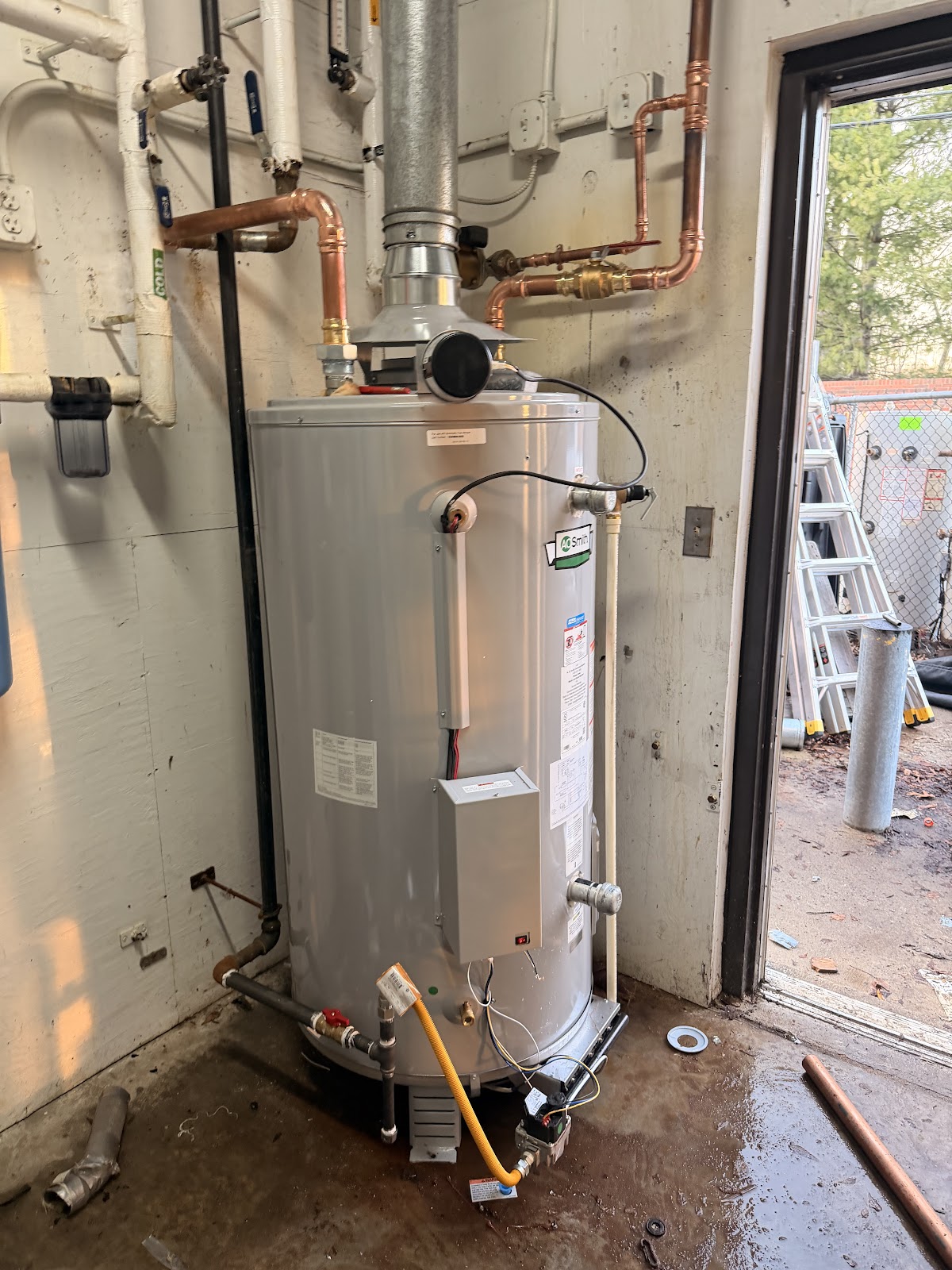 A new gas water heater set and piped in